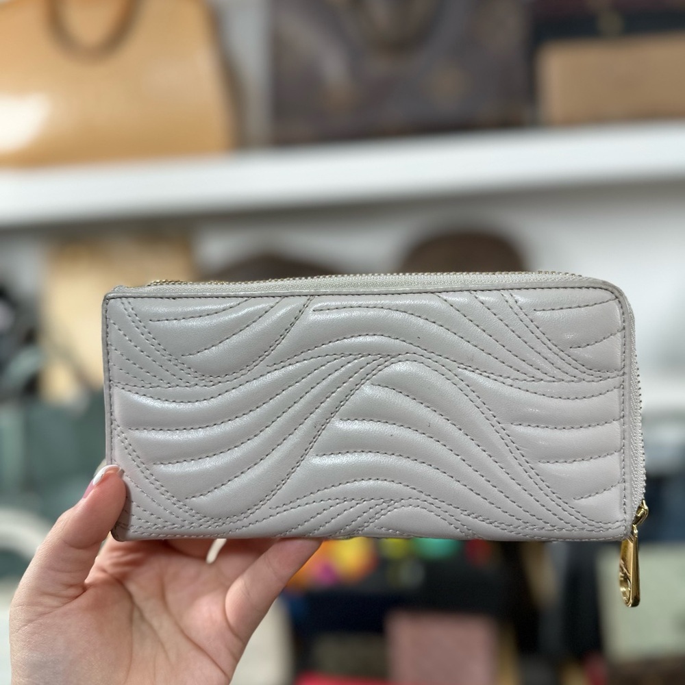 Ferragamo Rare Embossed Zip Wallet